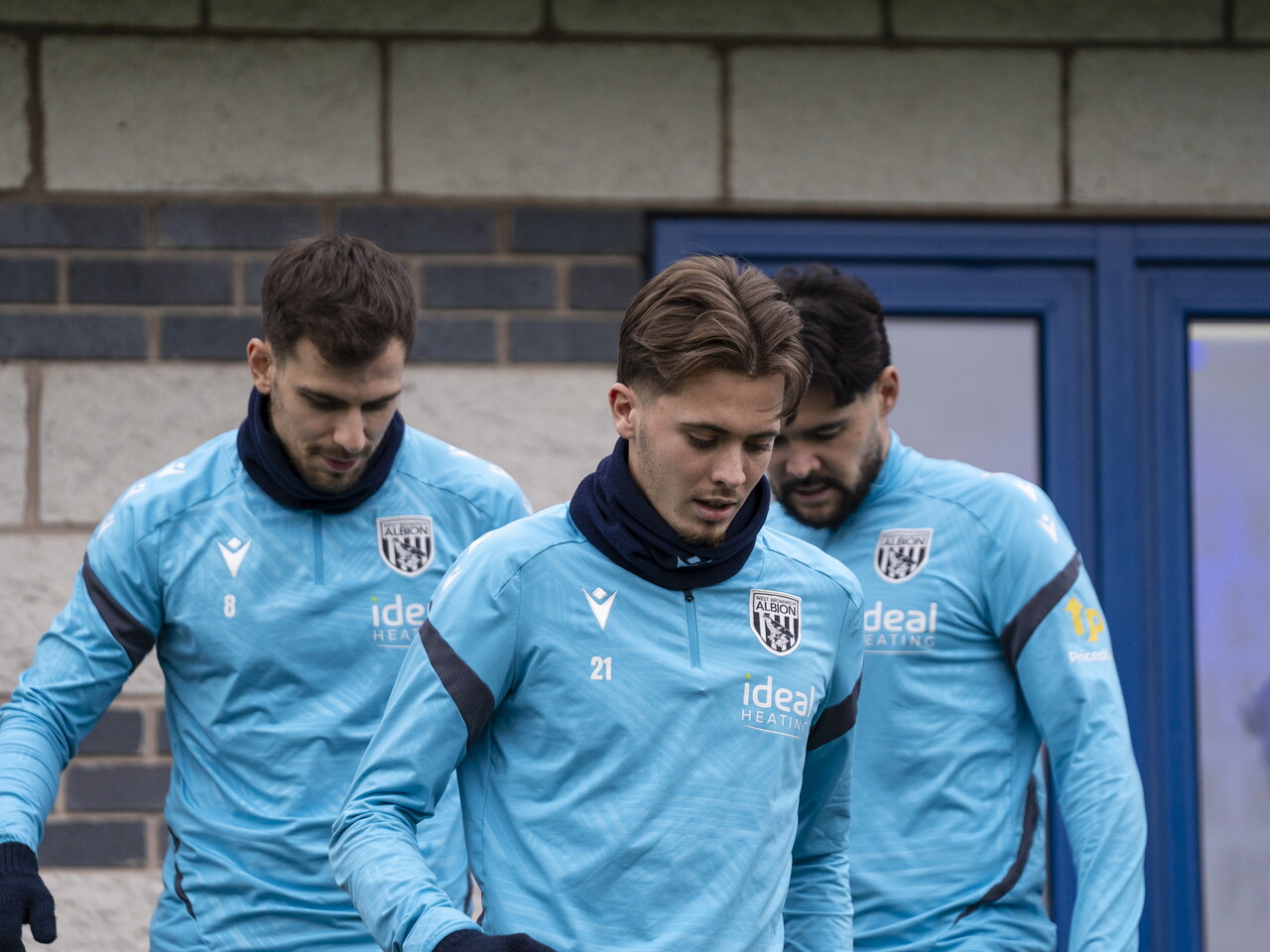 Jayson Molumby, Isaac Price and Alex Mowatt heading out to training