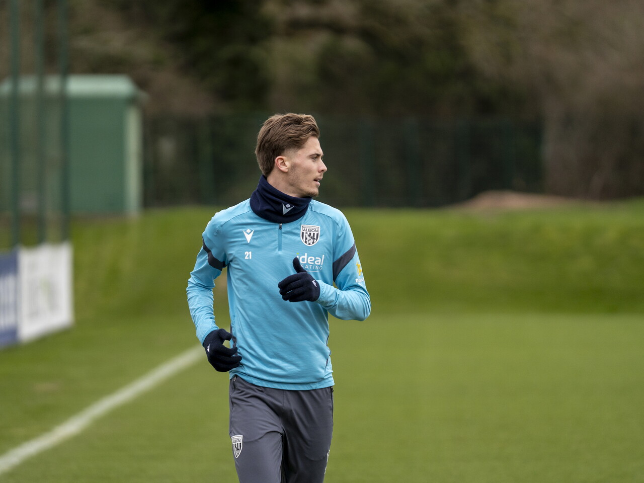 Isaac Price looking to the side during a training session