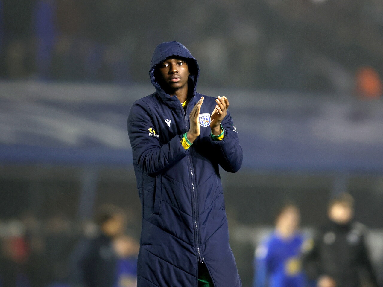 Jamaldeen Jimoh-Aloba applauding WBA fans after the draw at Birmingham