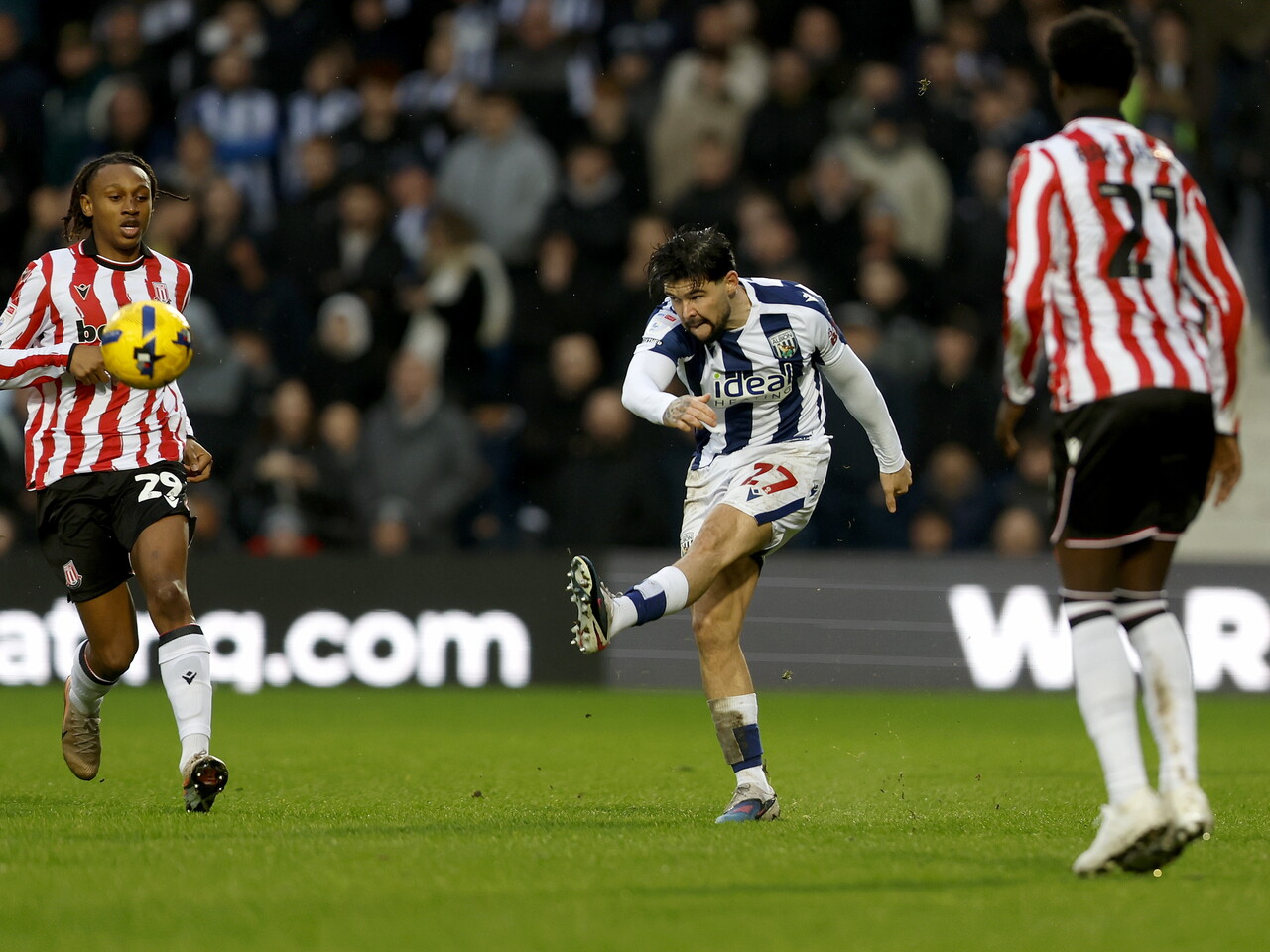Alex Mowatt passing the ball against Stoke 