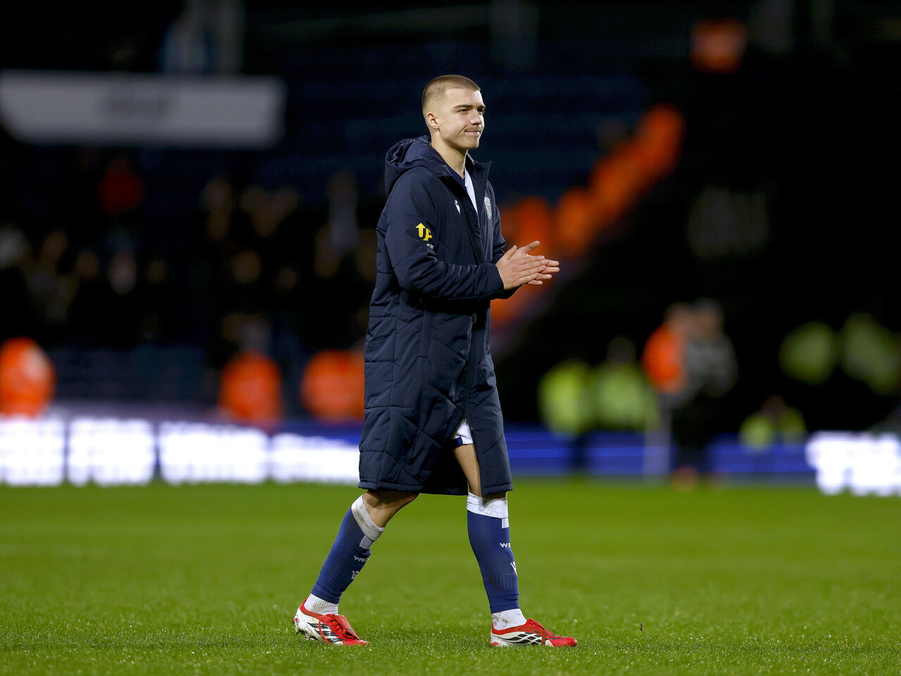 Alfie Gilchrist applauding WBA fans