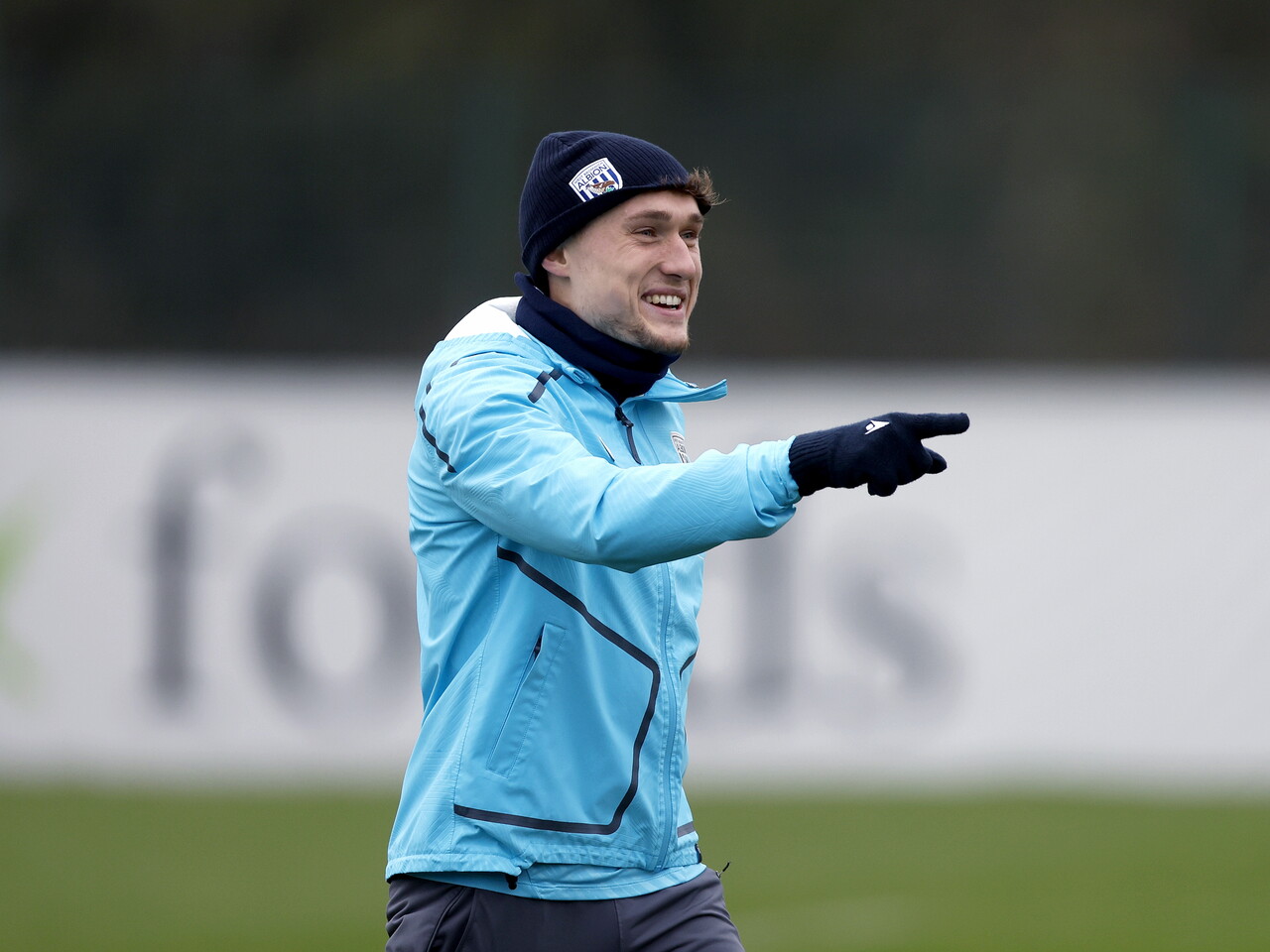 Callum Styles pointing and smiling during a training session