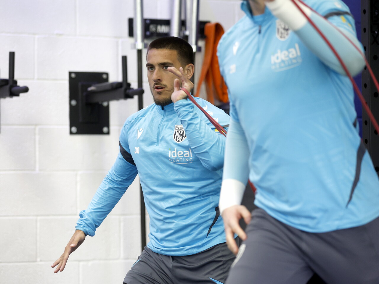Danny Imray stretching in the gym