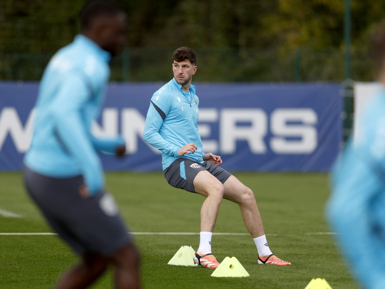 Chris Mepham warming up before a training session