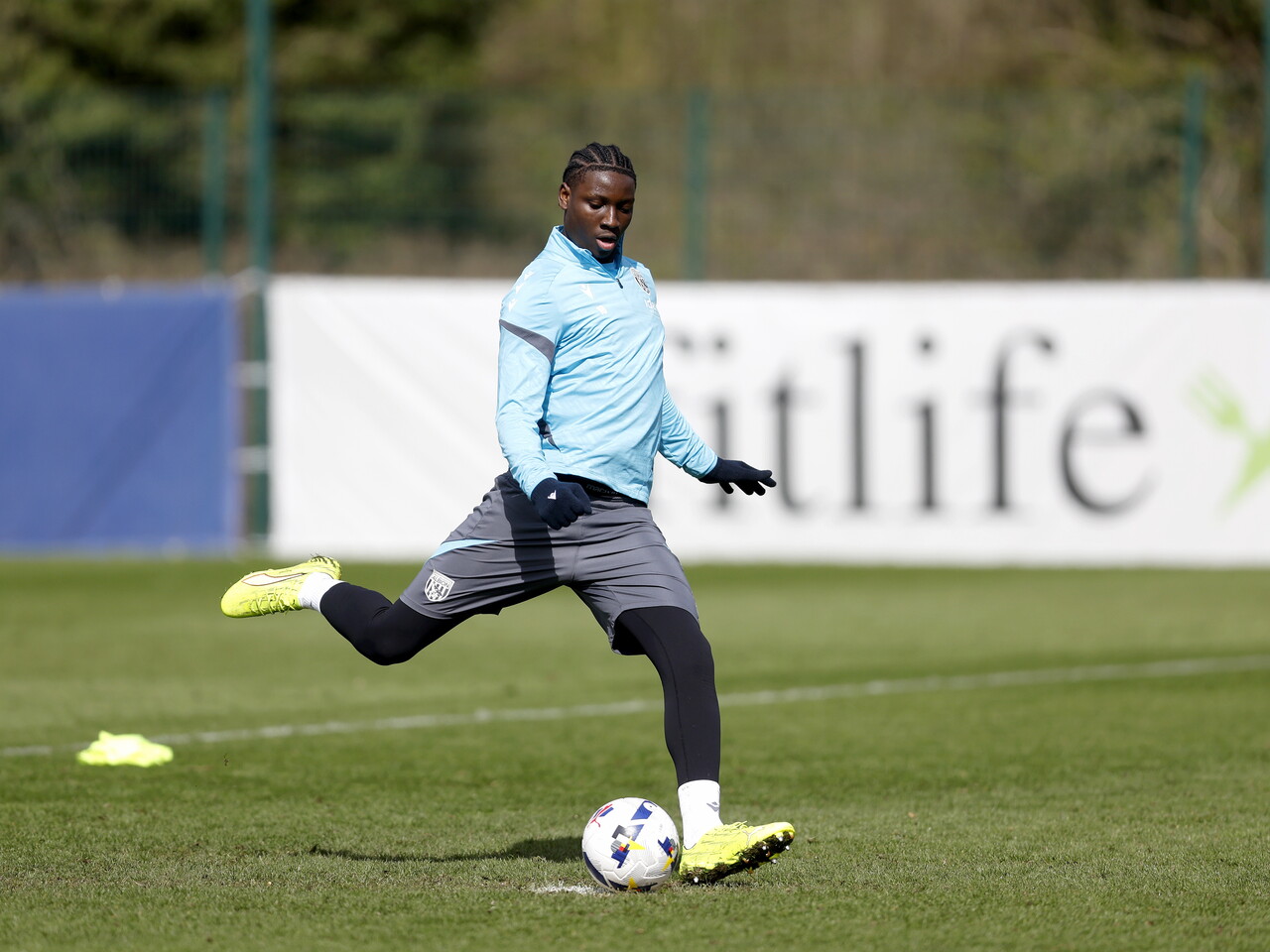 Jamal Jimoh-Aloba taking a penalty during training 
