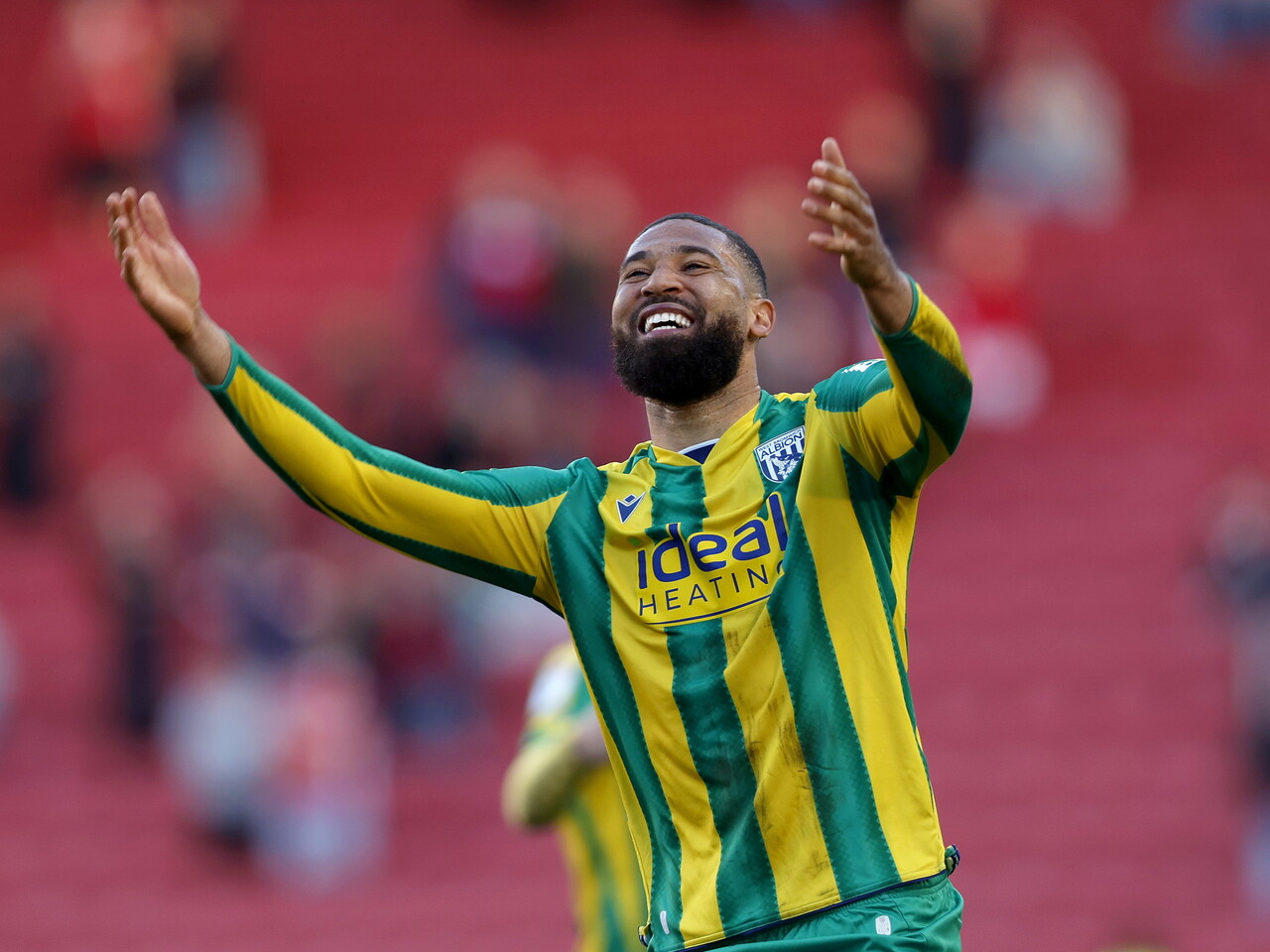 George Campbell celebrates at full-time