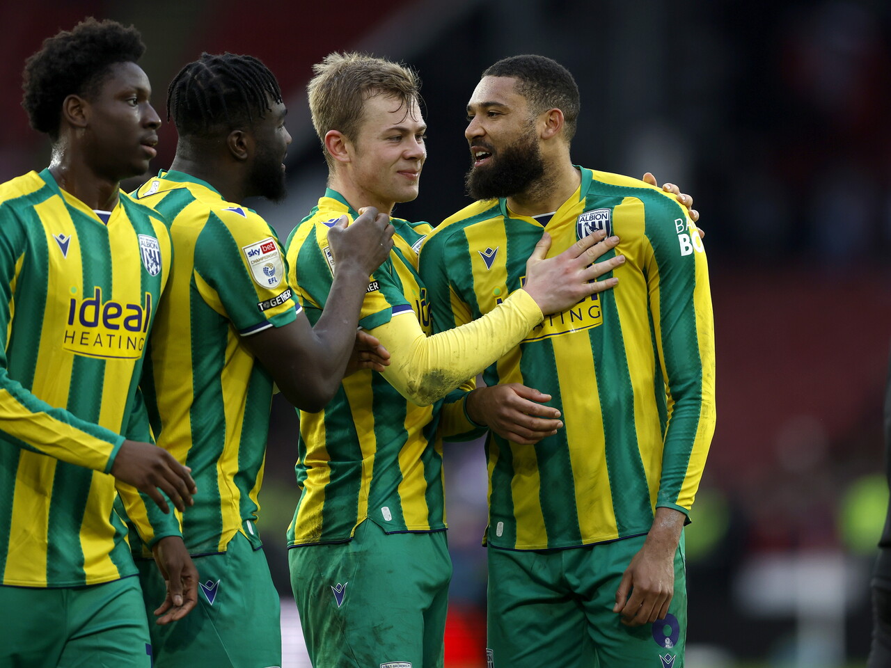 George Campbell and Aune Heggebø smiling and talking after the Sheffield United game