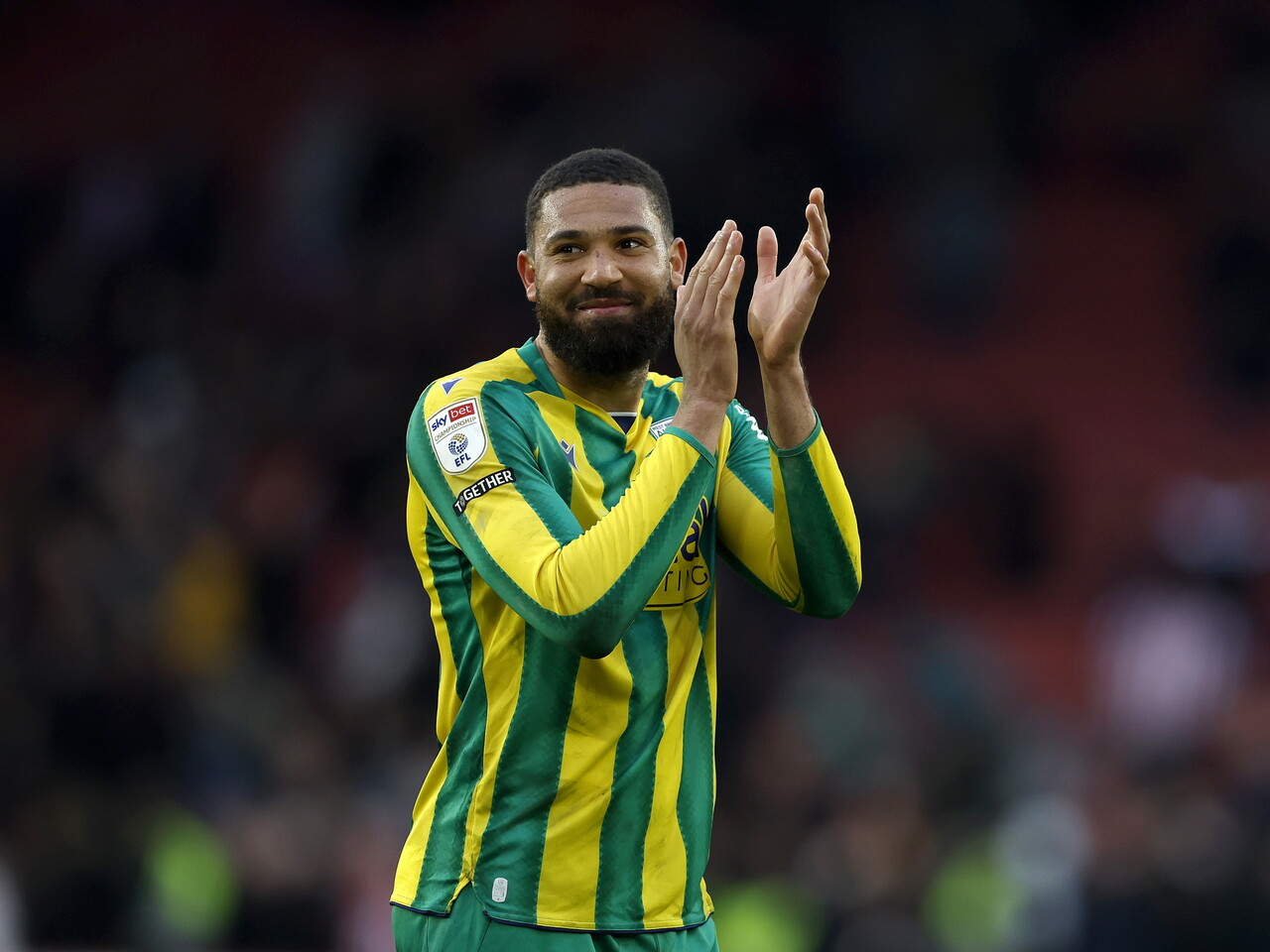 George Campbell applauding WBA fans after the Sheffield United game