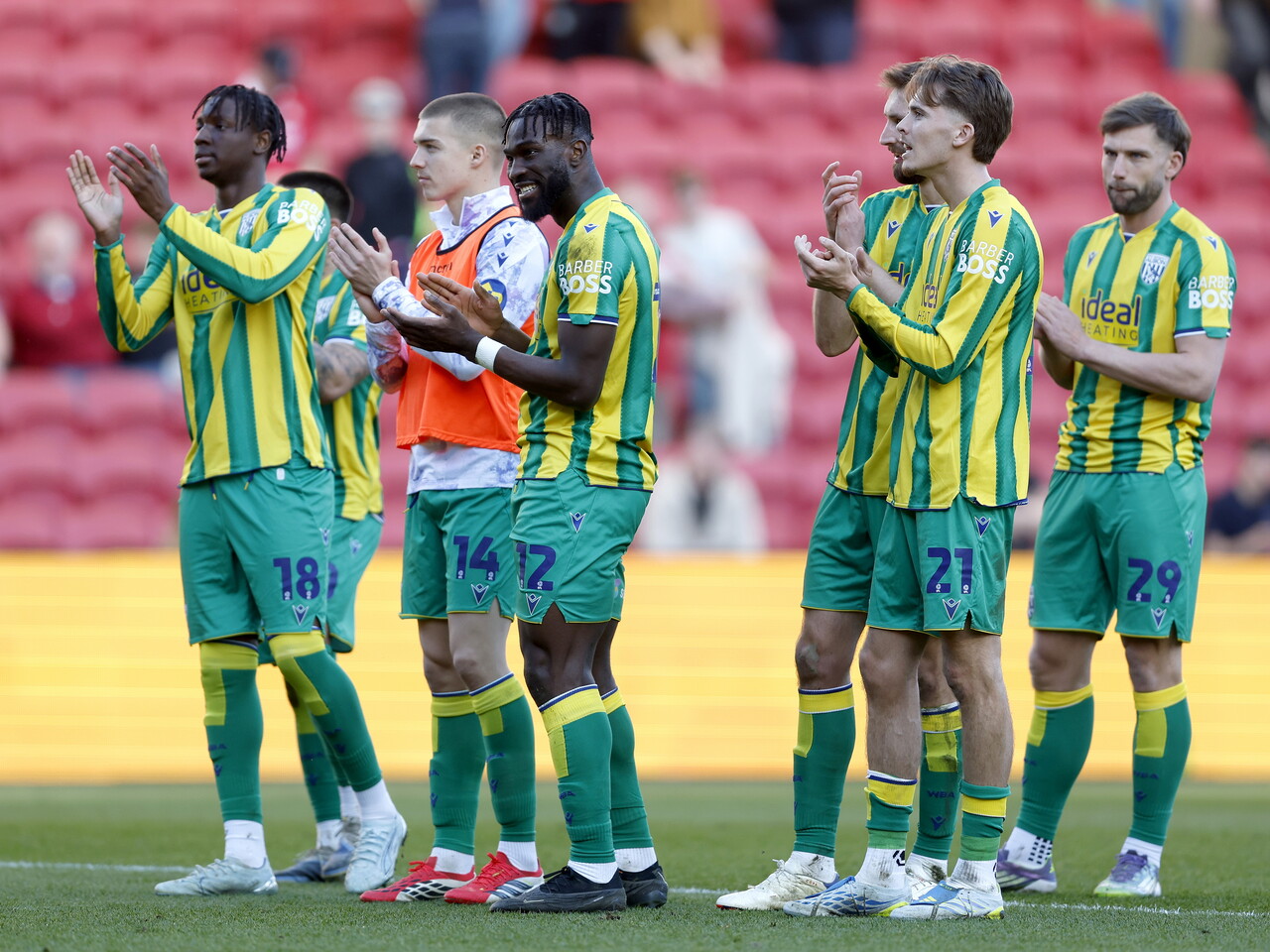 The team celebrate at full-time