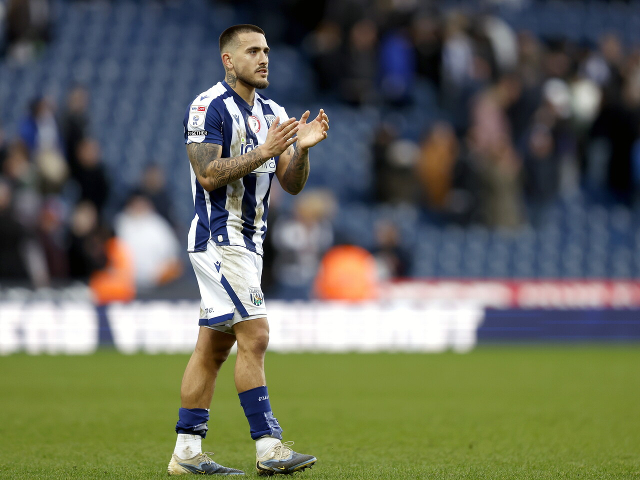 Danny Imray applauding WBA fans after the win over Hull