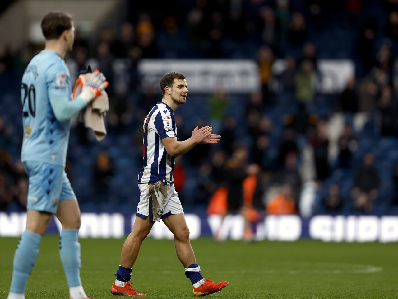 Jayson Molumby applauding WBA fans after the win over Hull