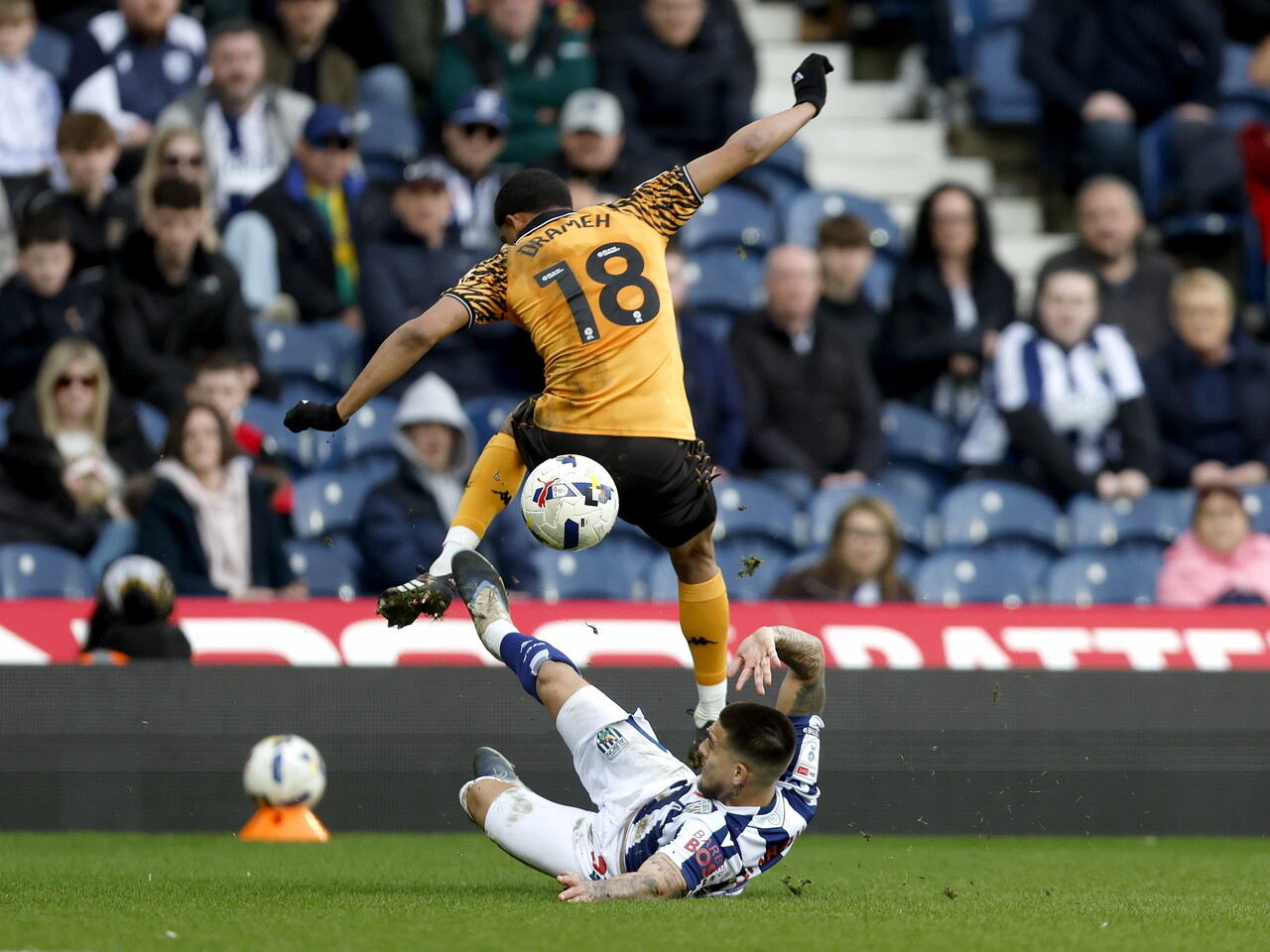 Danny Imray making a sliding tackle against Hull