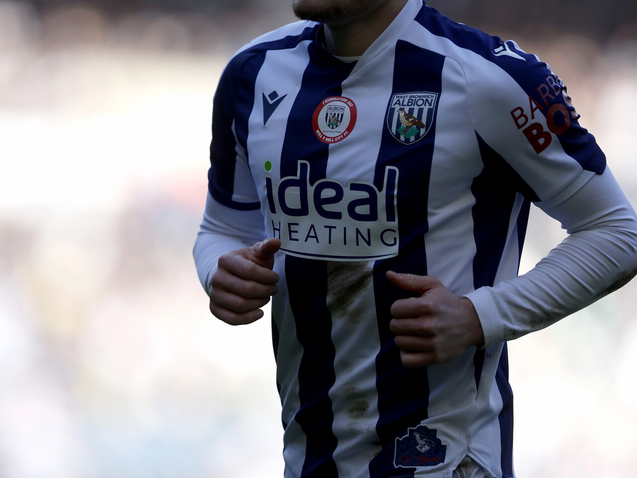 Foundation Day logo on a home WBA shirt during the game with Hull