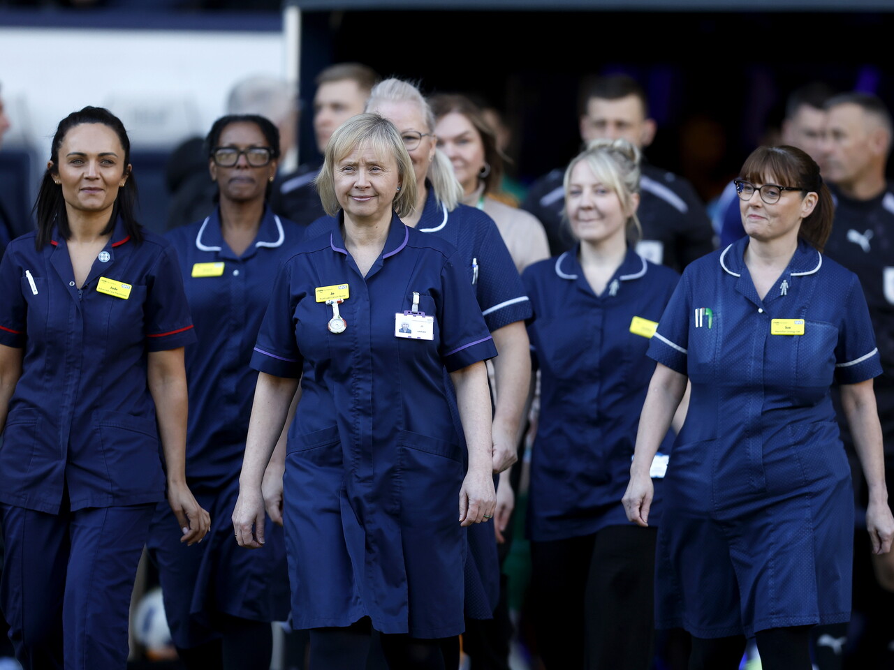 NHS nurses walking out of the tunnel at The Hawthorns