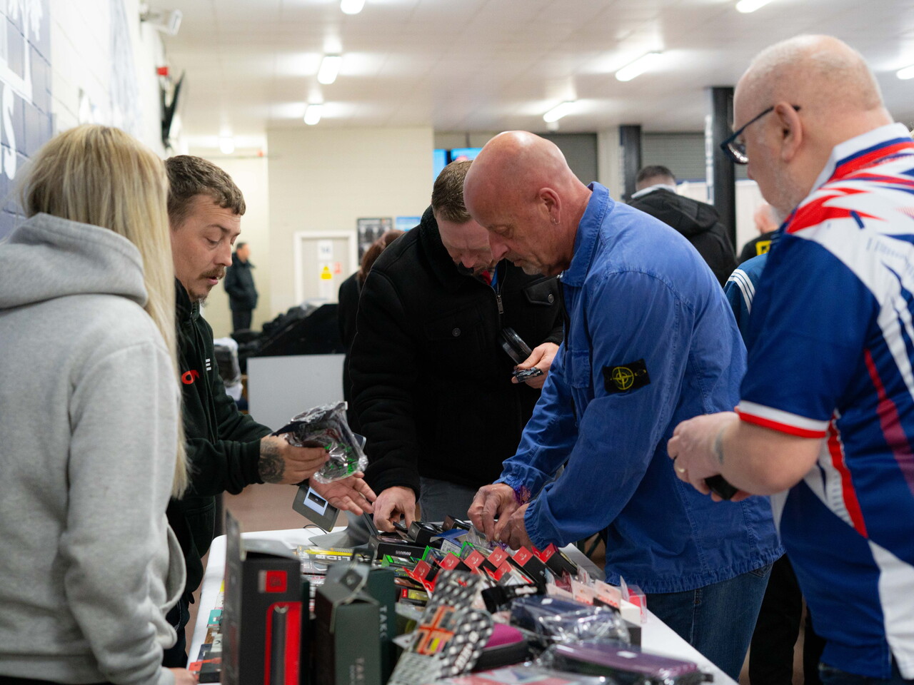 Guest purchase items from Bostin Darts pop-up shop