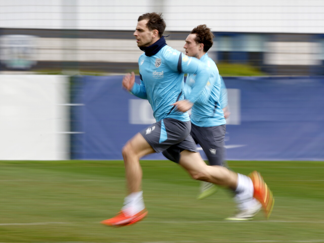 Jayson Molumby running forward at speed during a training session