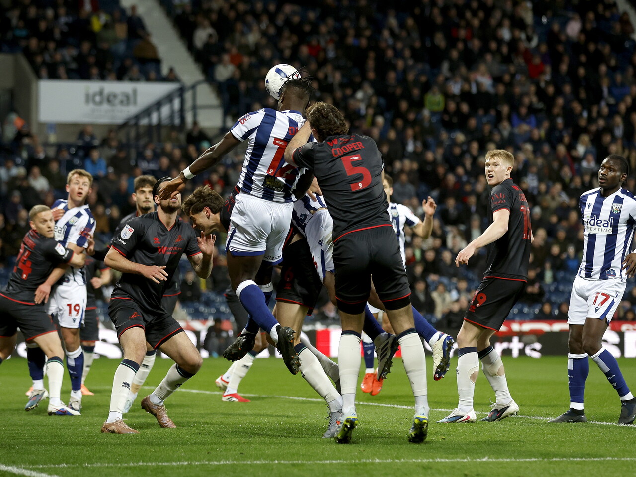 Daryl Dike jumping to win a header against Millwall