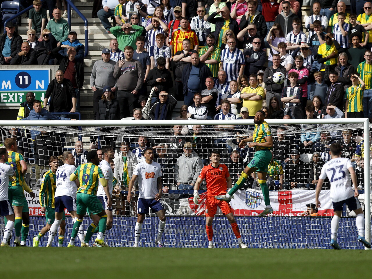 George Campbell heads the ball away against Preston