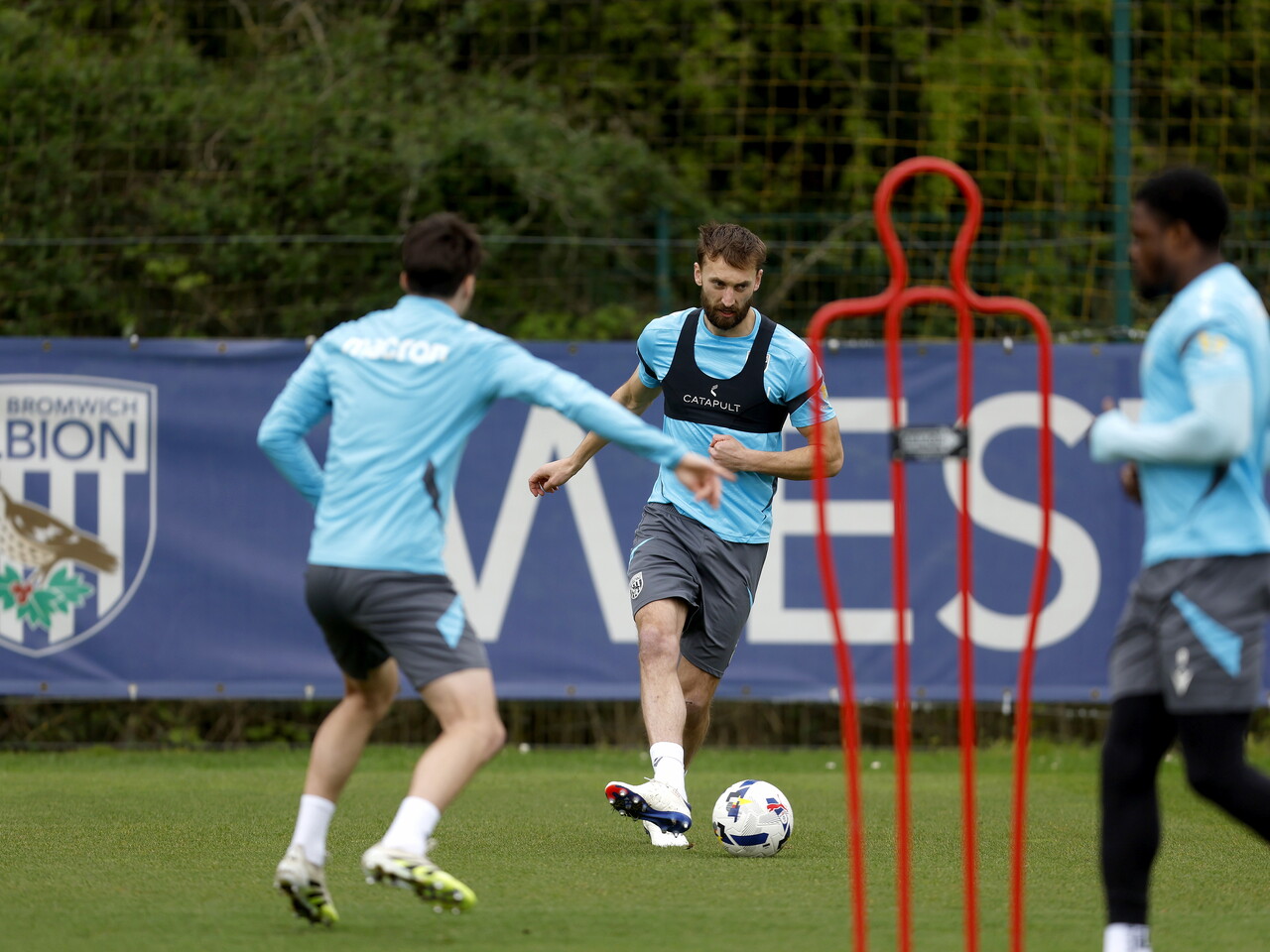 Nat Phillips passing the ball during training