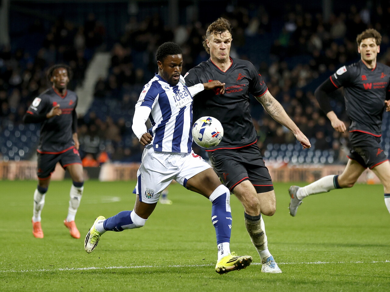 Josh Maja battling for the ball against Millwall
