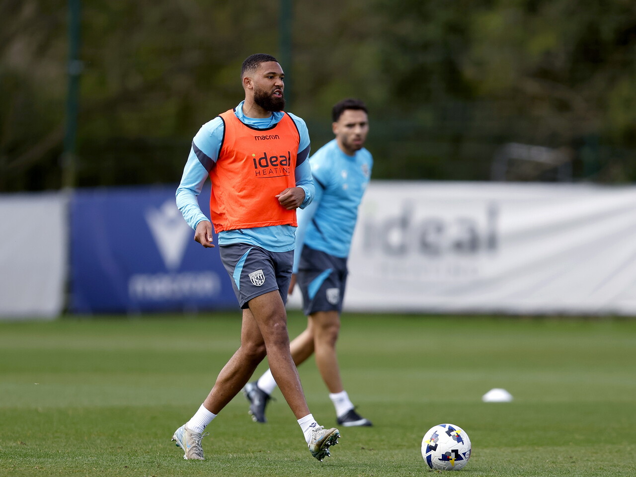 George Campbell on the ball during training 