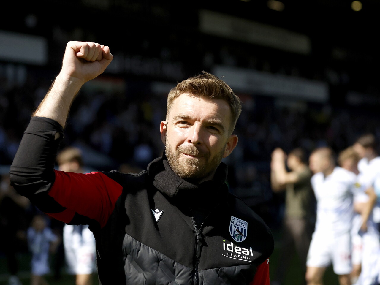 James Morrison applauding and celebrating with WBA fans after the Ipswich game