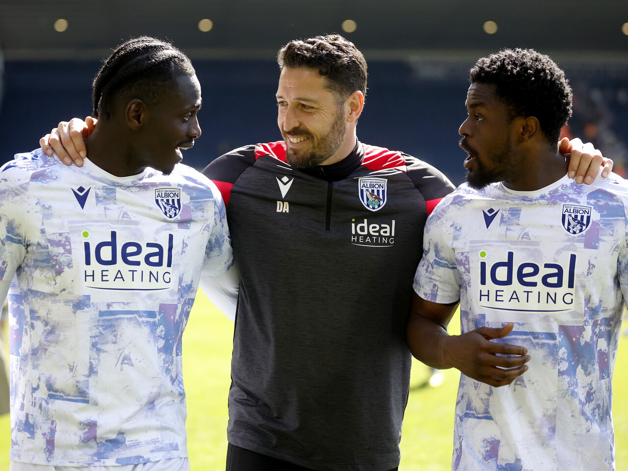 Damia Abella chatting with Ousmane Diakité and Josh Maja after the Ipswich game