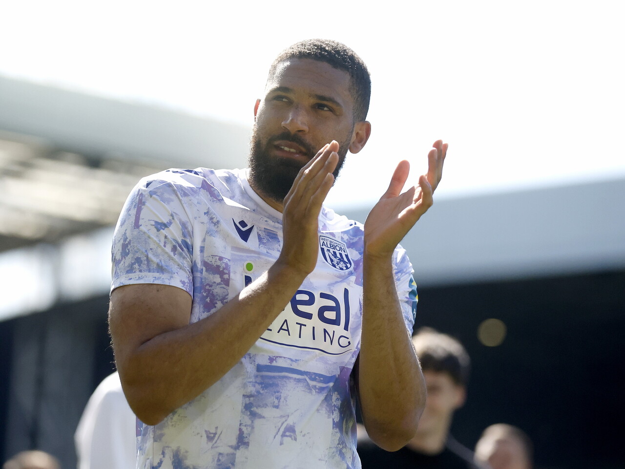George Campbell applauds WBA fans after the Ipswich game 