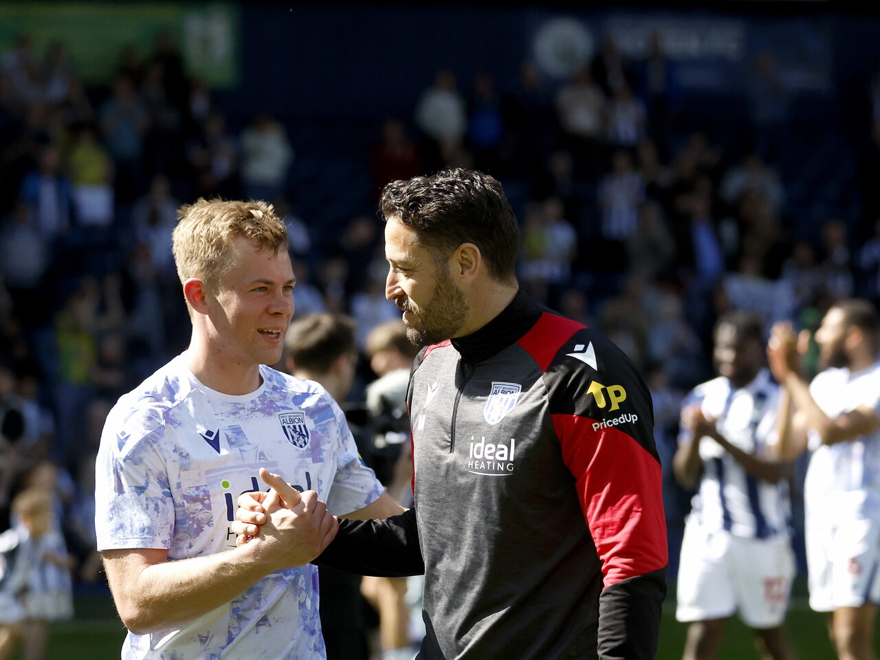Aune Heggebø and Damia Abella shake hands after the Ipswich game