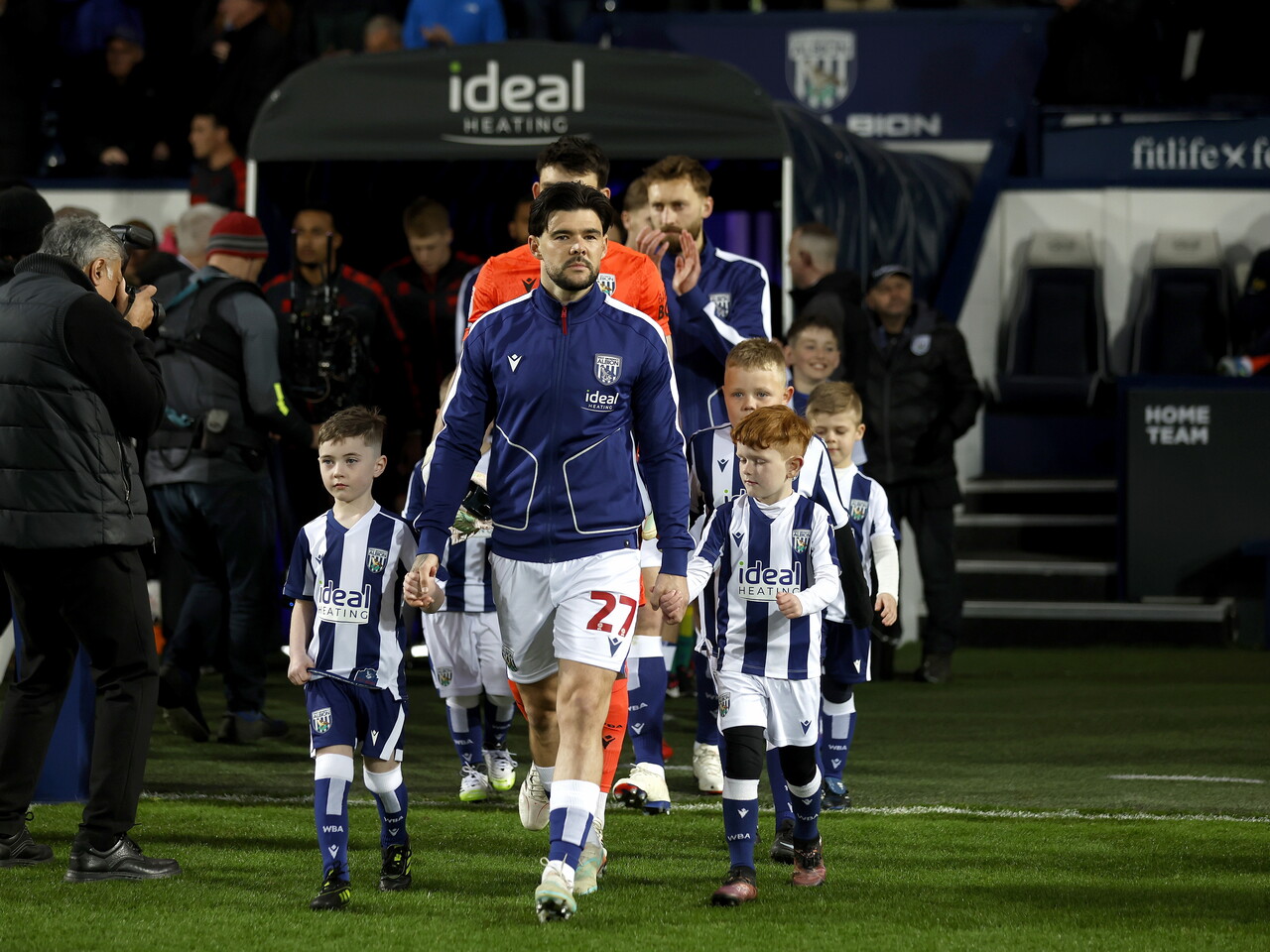 Alex Mowatt leading Albion out at The Hawthorns against Millwall