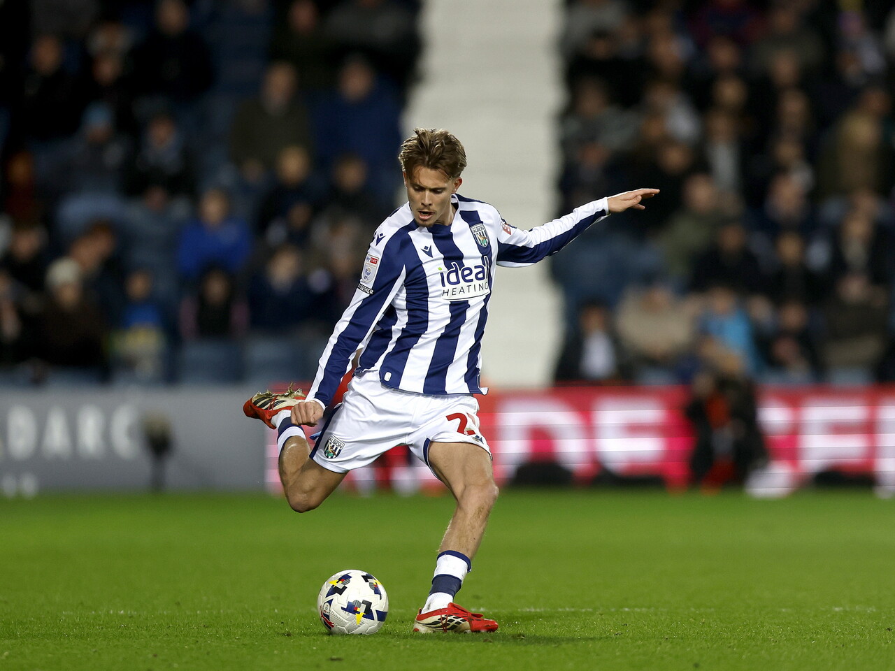 Isaac Price on the ball against Wrexham