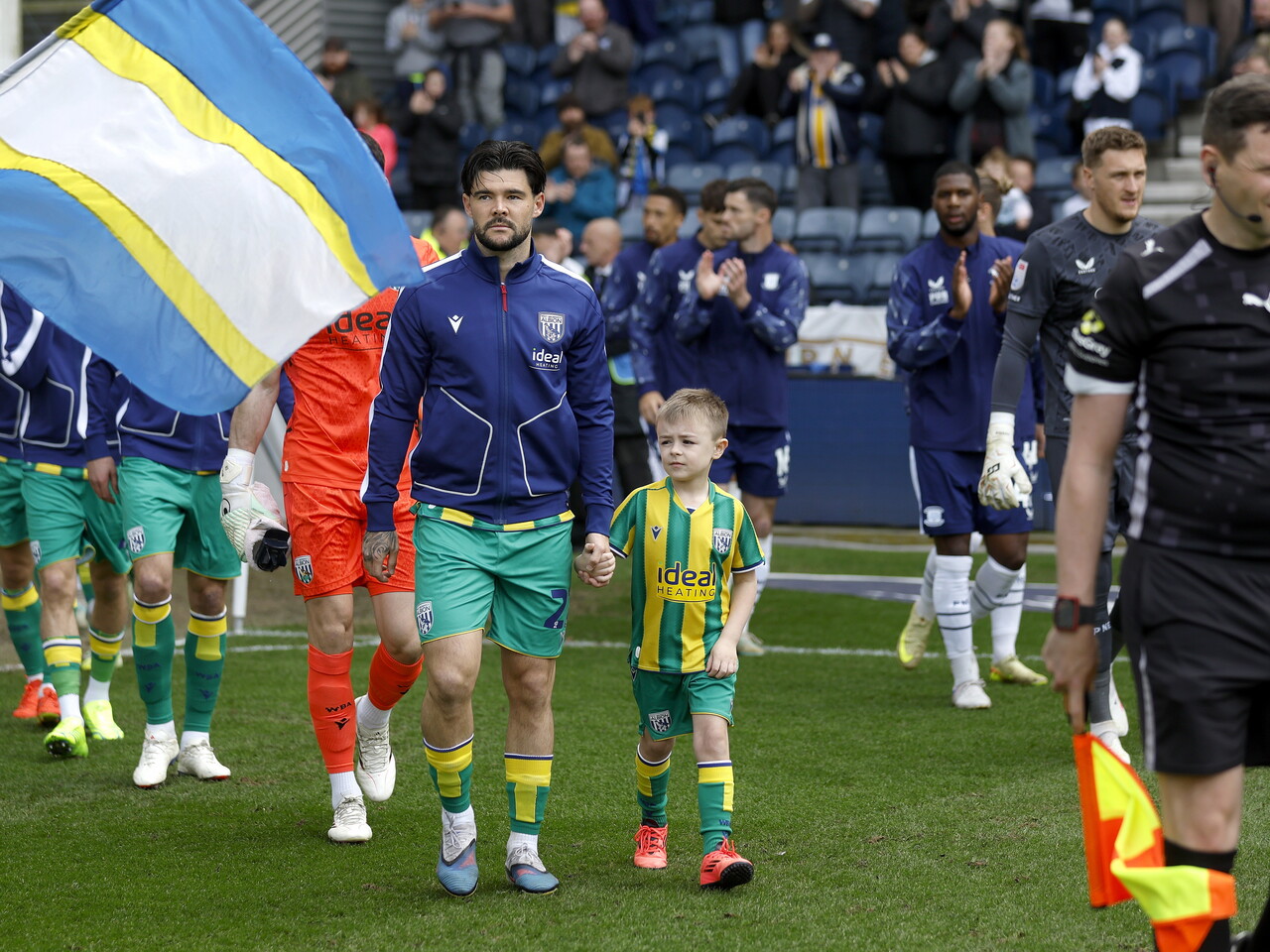 Alex Mowatt leads Albion out at Preston