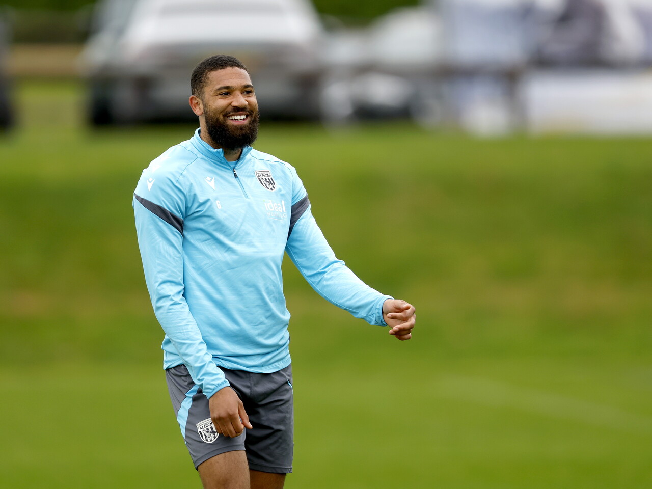 George Campbell smiling during a training session