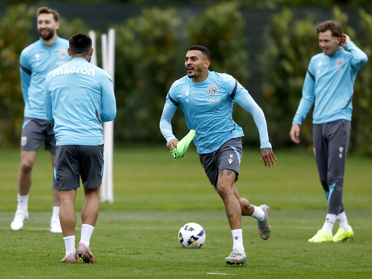 Karlan Grant running forwards during training 