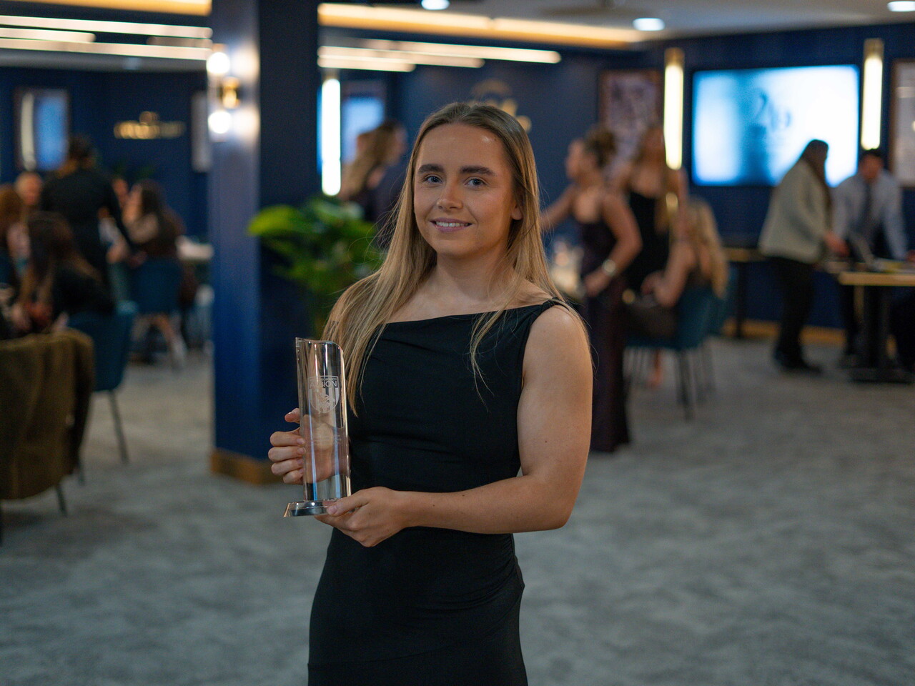 Ella Haughey receives her Young Player of the Season award.