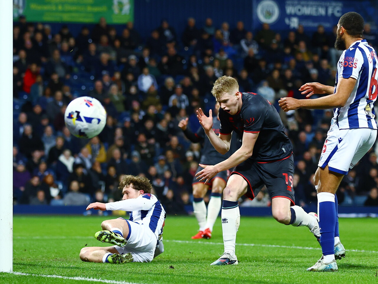 Josh Coburn of Millwall misses a chance