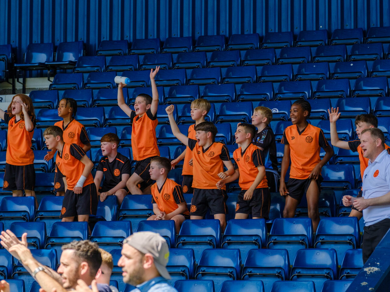 St Kevin's FC U11 cheering from the stands