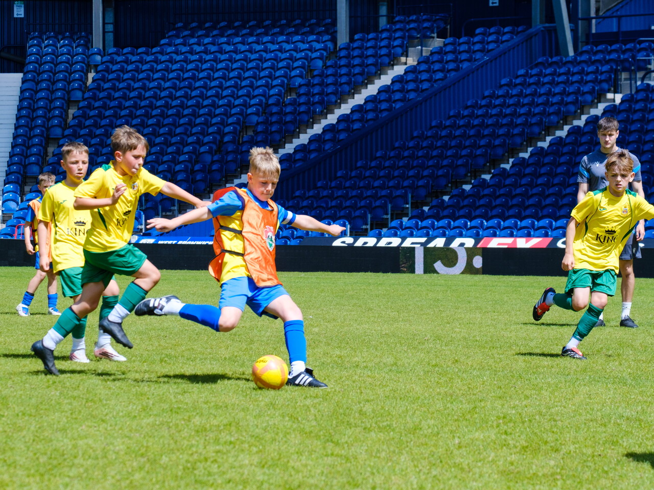 Player in the motion of striking the ball.