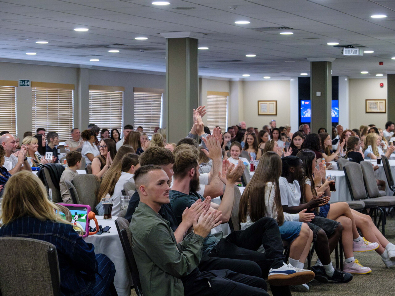 Wide shot of parents and players at GGP Awards evening.
