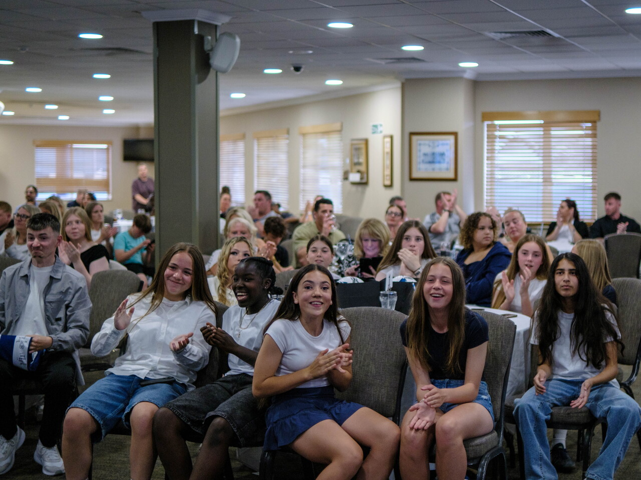 Wide shot of parents and players at GGP Awards evening.