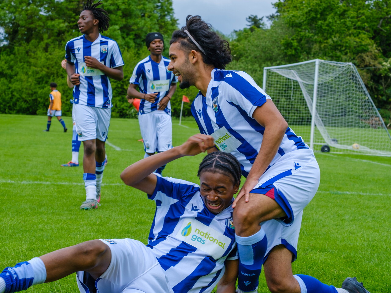 Players celebrating after a goal