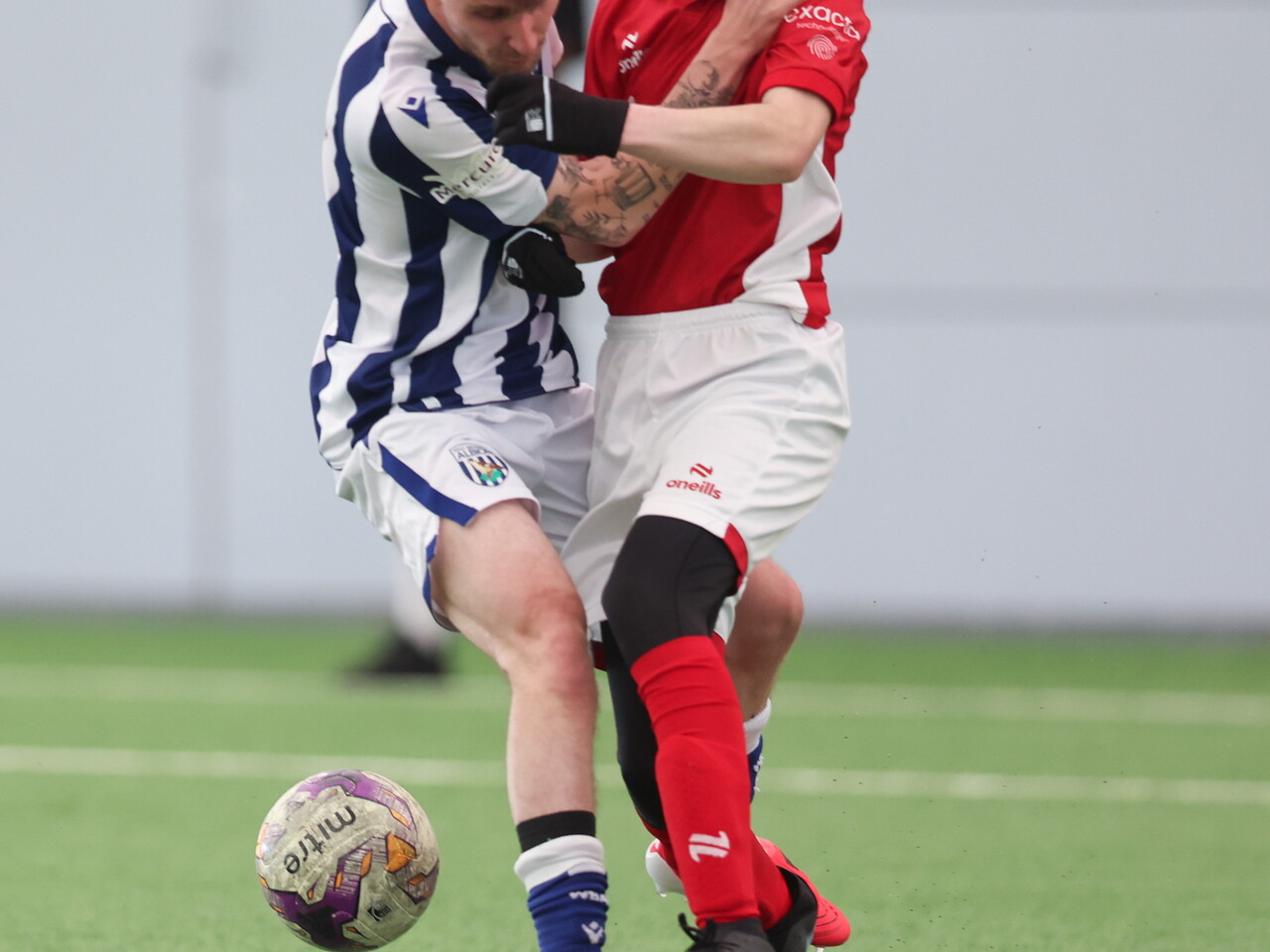 WBA Player battling for possession.