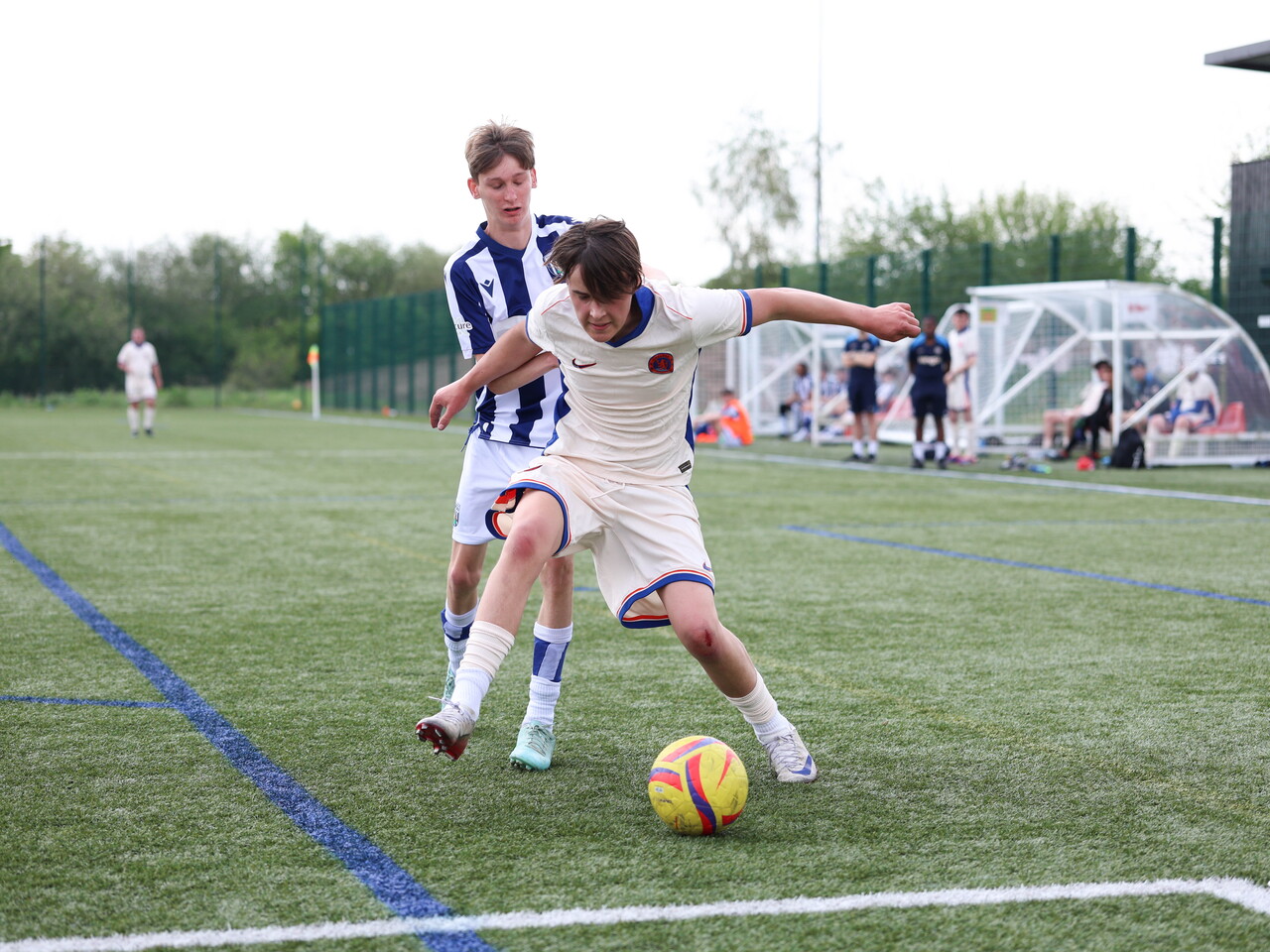 WBA Player battling for possession.