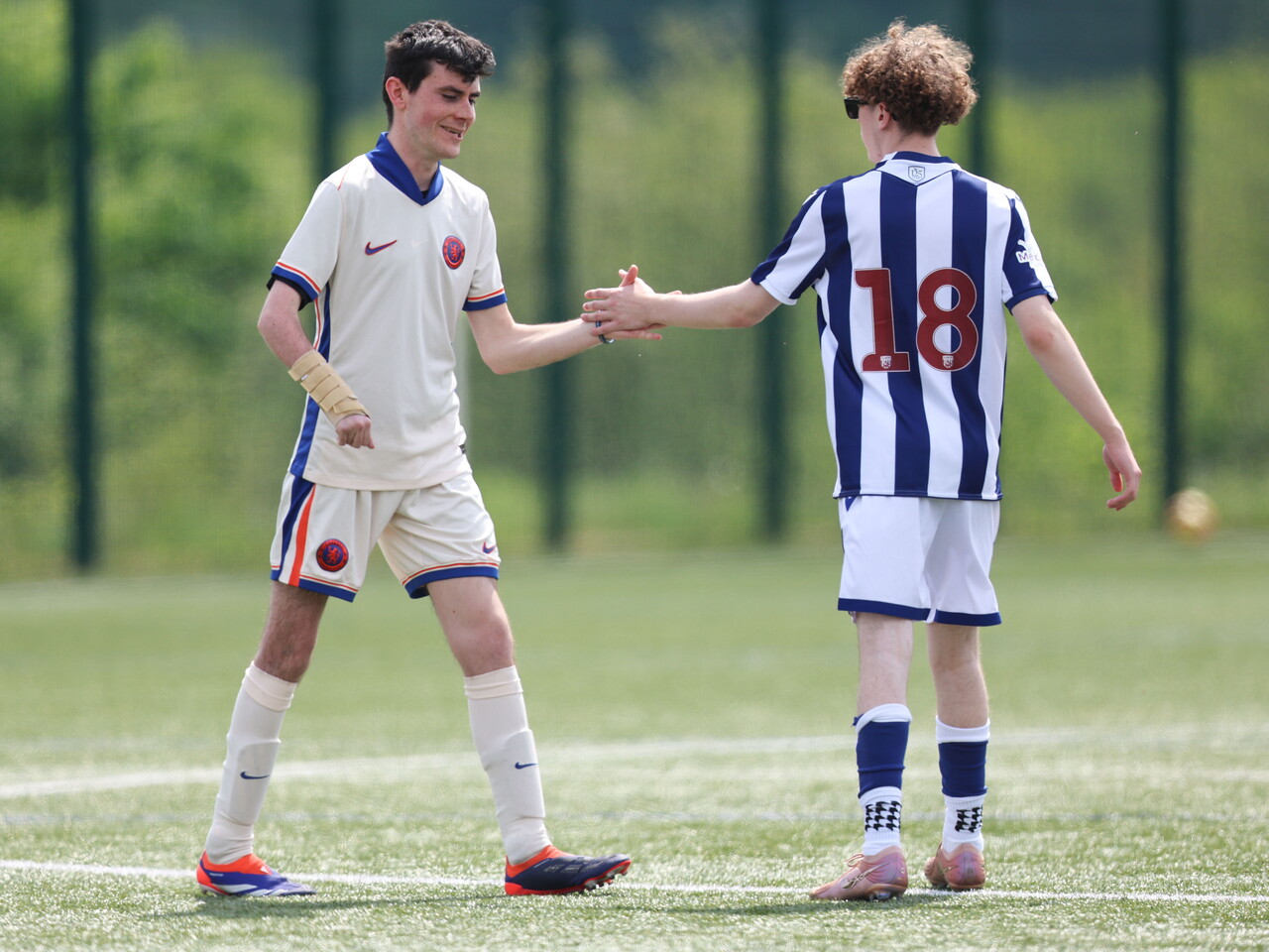 WBA player shaking hands with an opponent.