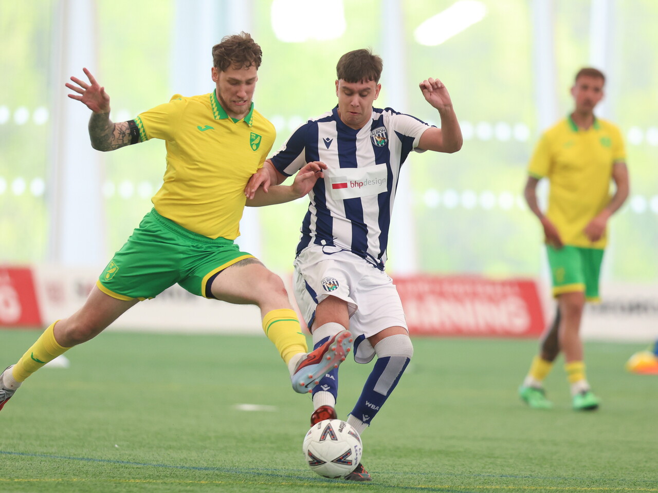 WBA player holding off the opposition.