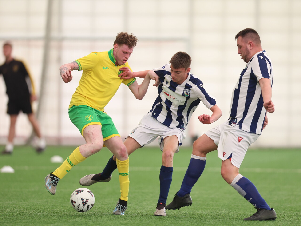 WBA Players battling for possession.
