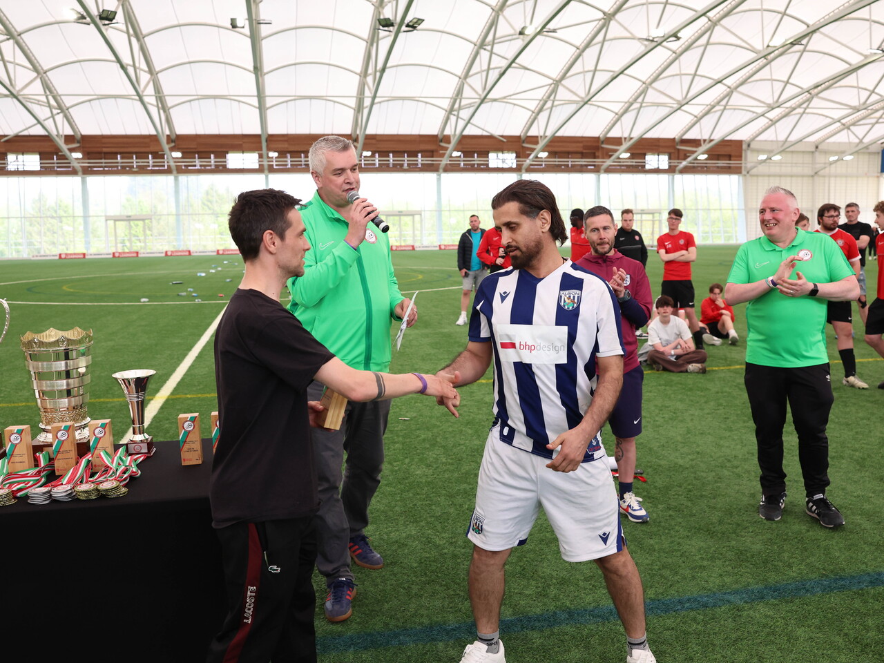 Saj receiving Goal of the Tournament award.