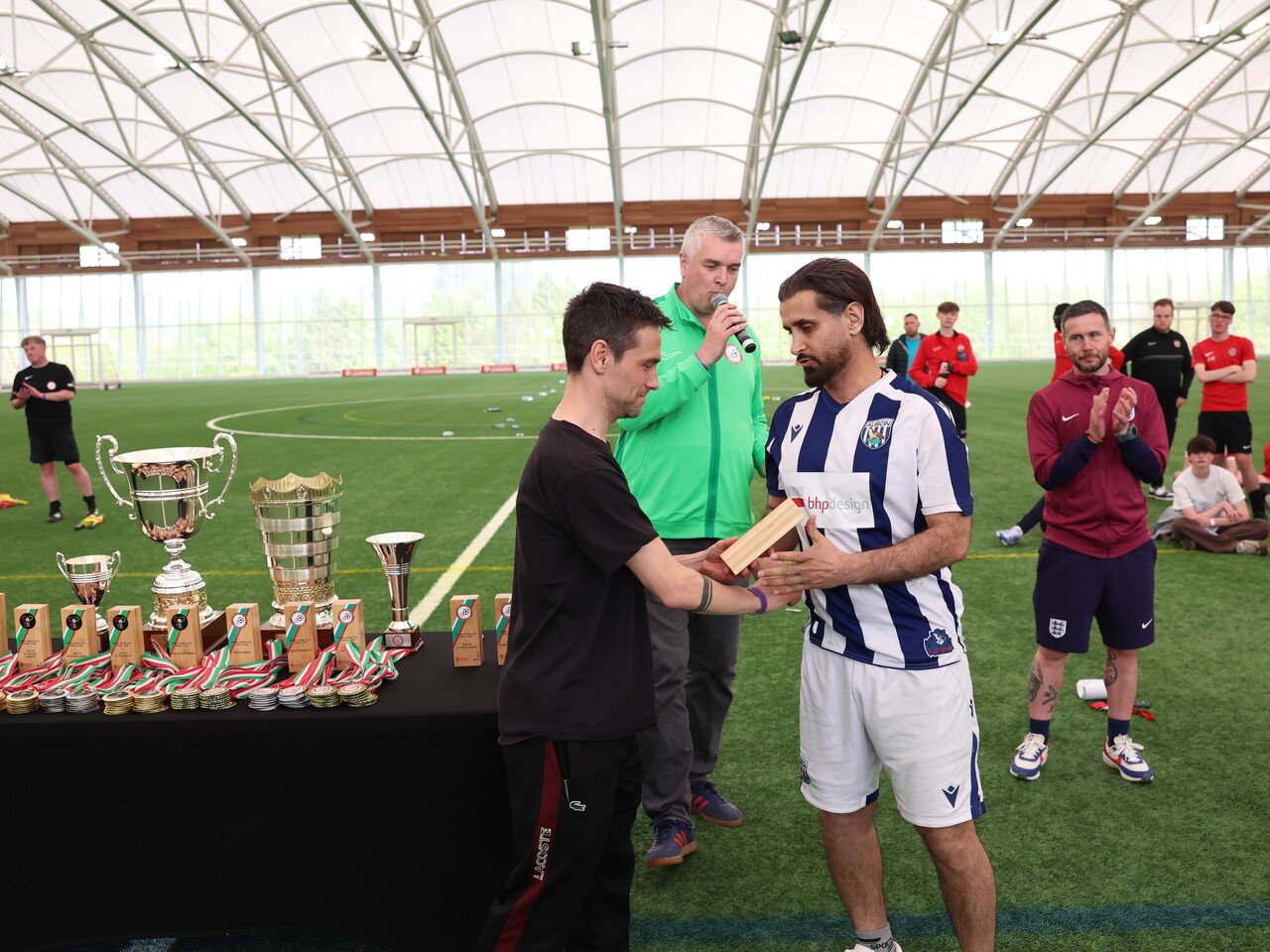 Saj receiving Goal of the Tournament award.