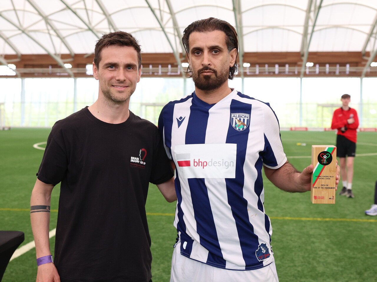 Saj posing for a photo with Goal of the Tournament award.