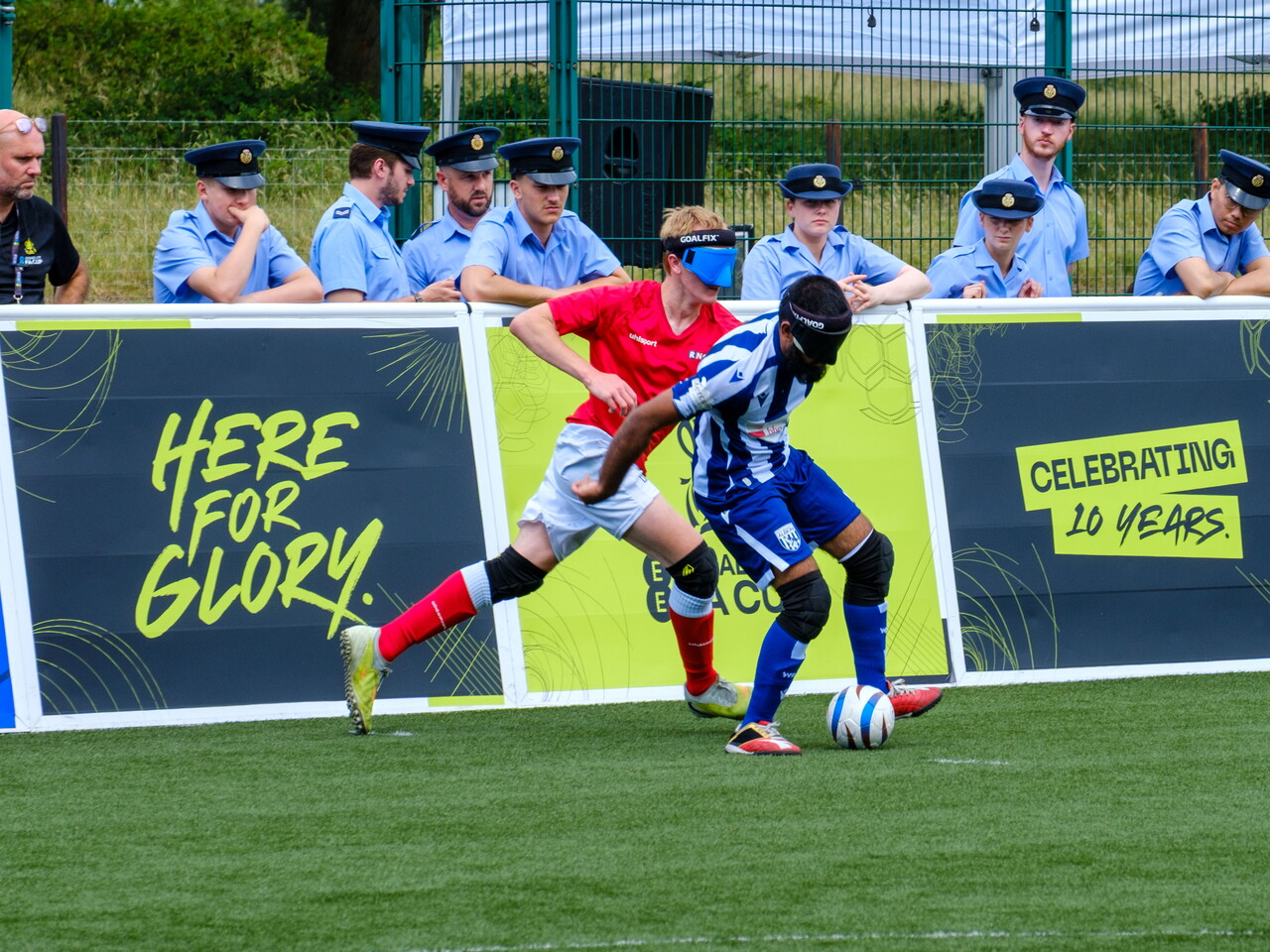 Eesa shielding a RNC player from the ball.